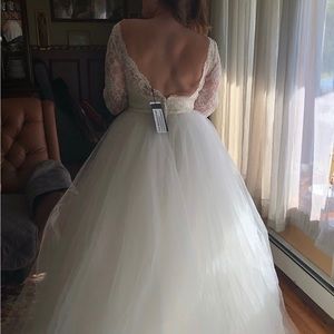 NEVER BEEN USED wedding dress.